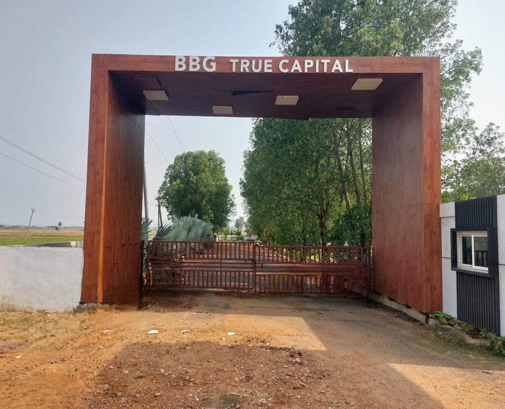 Entrance arch of True Capital plotted development project in Anandapuram, Vizag
