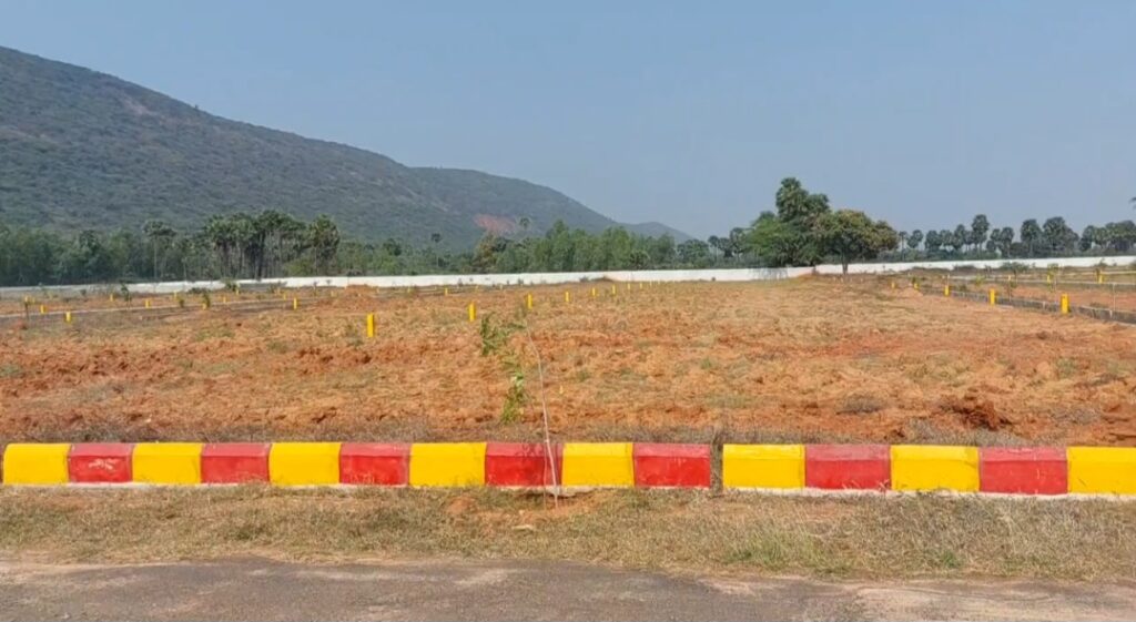 VMRDA approved plots near Anakapalli with open residential layout and scenic hill backdrop