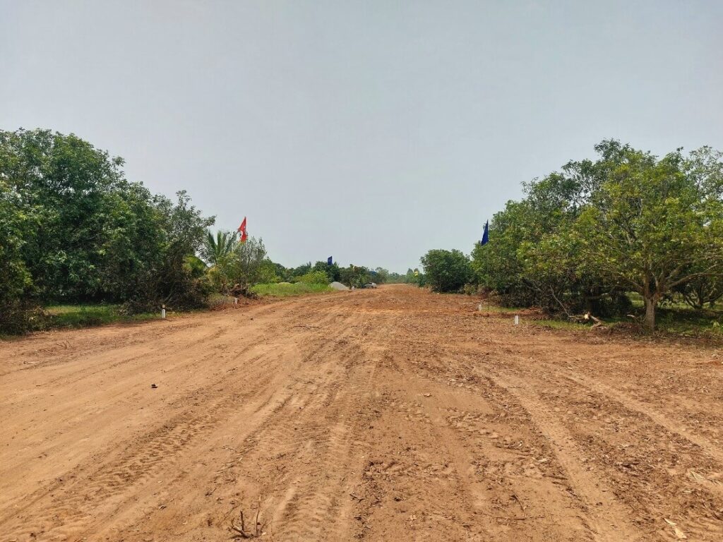 Road development work at BBG Beverly Hills Bhogapuram VMRDA-approved residential & villa plots near Bhogapuram Airport.