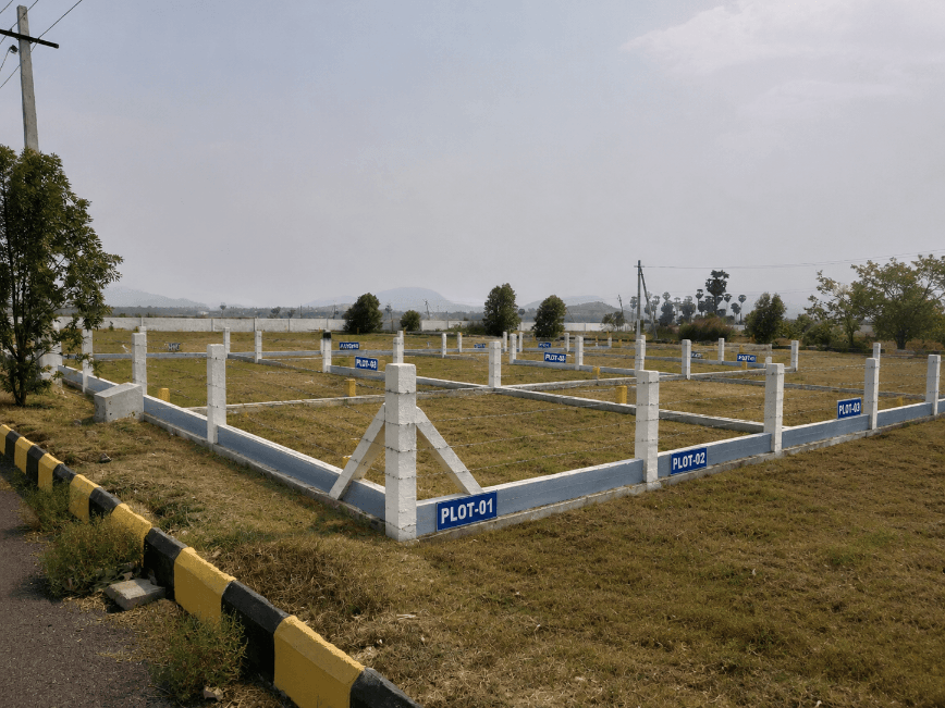 Mortgage plots in a VMRDA approved layout secured with barbed wire fencing before release to buyers.